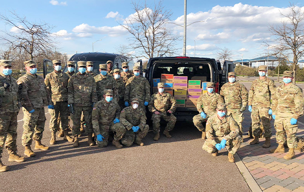 National Guard with Girl Scout Cookies from Operation:Cookie donations