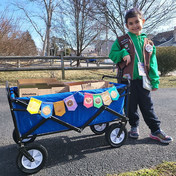 Girl Scout Brownie from Troop 308 walking sale